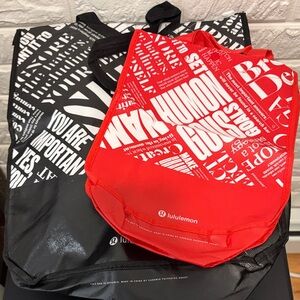 lululemon athletica Black and Red Graphic Tote Bags